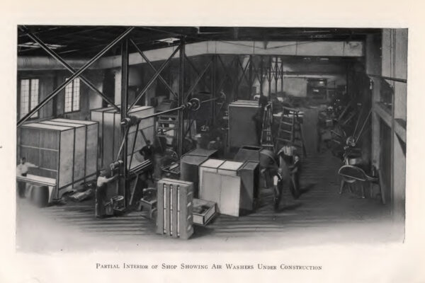 In page image of Carrier air washer being installed in a shop